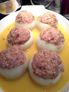 Chicken Stock in Dish with Stuffed Onions